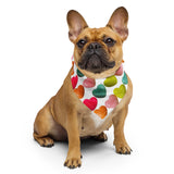 Adorable dog flaunting the matching colorful heart-print bandana